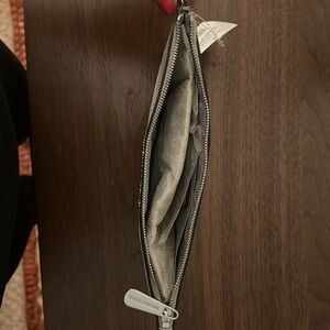 Michael Kors wristlet/wallet. Brand new with tags. Super cute but bought two.